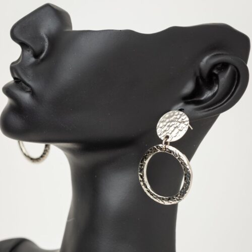 Handmade and hand-hammered silver earrings crafted in Kenya ring
